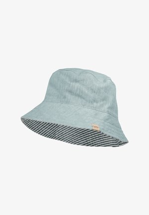Light blue bucket hat with wide brim showing black and white striped underside and small beige brand label on side.