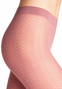 Leggings rosa con texture, dotati di una vita alta, caratterizzati da un motivo sottile e una finitura liscia in un design aderente.