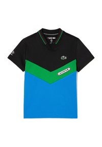 Black polo shirt with green and blue chevron design. Features a ribbed collar with red and green details. Lacoste logo on front.