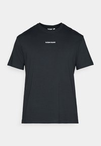 Black short-sleeve t-shirt made of cotton with a crew neckline and a white "BJÖRN BORG" logo printed on the chest. Simple, sleek design.