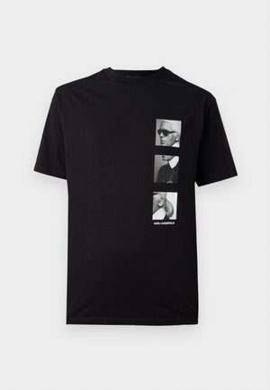 Black cotton t-shirt featuring three monochrome portrait graphics with the text "KARL LAGERFELD" at the bottom. Short sleeves, crew neck.