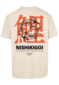 Beige cotton t-shirt featuring a vibrant red and black graphic of koi fish, with stylized text "NISHIKIGOI" beneath.