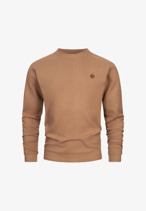 Brązowy, prążkowany sweter z długim rękawem, okrągłym dekoltem i małym, okrągłym logo na piersi. Miękka tekstura i dopasowany krój.