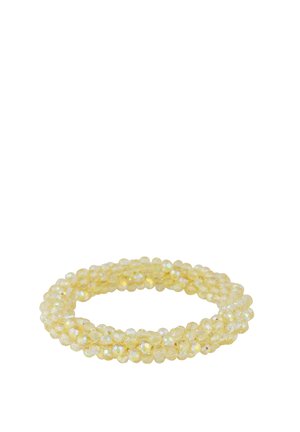 Stretchy bracelet made of multiple strands of small, translucent, faceted pale yellow beads with an iridescent finish.