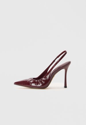 Burgundy patent leather slingback pump with a pointed toe, gathered texture at the front, and a slim stiletto heel.