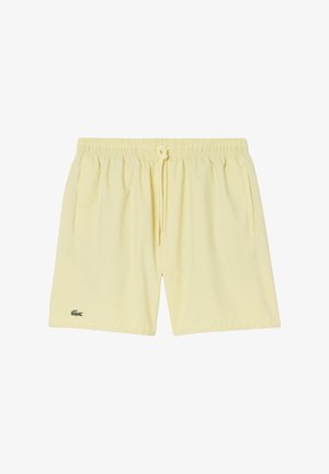 Lichtgele zwembroek met elastische tailleband, trekkoord, zijzakken en een klein groen krokodillenlogo op het linkerbeen.