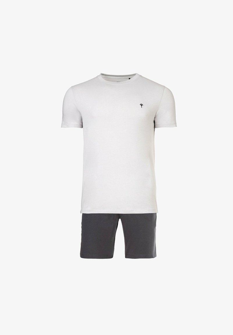 Conjunto de dos piezas para hombre que incluye una camiseta blanca de algodón con un logo de palmera negra y pantalones cortos grises hechos de material ligero.