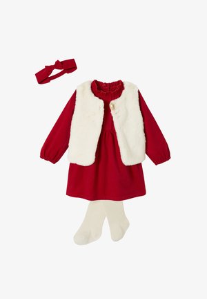 Red long-sleeve dress with white faux fur vest, matching red headband with bow, and cream-colored tights for a toddler girl.