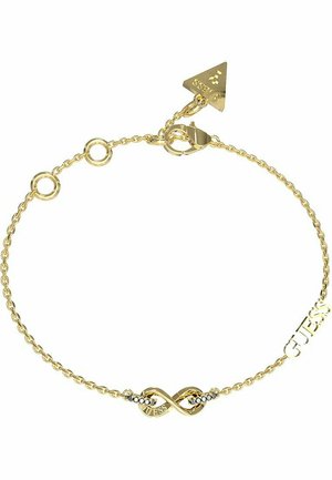 Das goldene Armband verfügt über ein Unendlichkeitssymbol und das Wort "GUESS", mit runden Gliedern und einem verstellbaren Verschluss. Strukturierte Oberfläche, polierte Akzente.