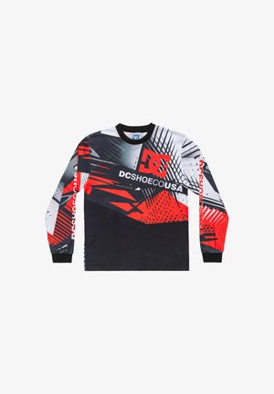 Chemise à manches longues avec une base noire, présentant un design graphique audacieux en rouge et blanc, des poignets noirs et le logo "DCSHOEUSA" sur le devant.
