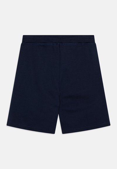 Marinblå bomullsshorts med elastisk midja, rak passform och sömda fållar. Inga fickor eller ytterligare dekorationer.