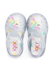 Clear, glittery sandals with a unicorn design and colorful mane. Features cut-out sides and a secure strap. Insole displays star patterns.