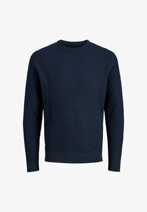Tamno plavi pleteni pulover s teksturiranim dijamantnim uzorkom, okruglim izrezom i rebrastim manžetama i rubom. Mješavina pamuka i vune.