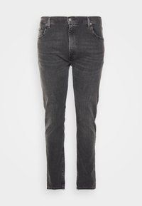 Zwarte denim jeans met een slim fit, voorzien van vijf zakken, een knoopsluiting en subtiele vervaging op de stof voor textuur.
