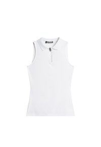 Ärmstolp i vitt med krage, framdragkedja och broderad logotyp på vänster sida. Slät tyg med en figursydd design.