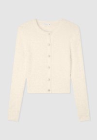 Cardigan di colore crema, morbido e soffice, con maniche lunghe e scollatura rotonda. Presenta sei bottoni decorativi sul davanti. Lunghezza corta.