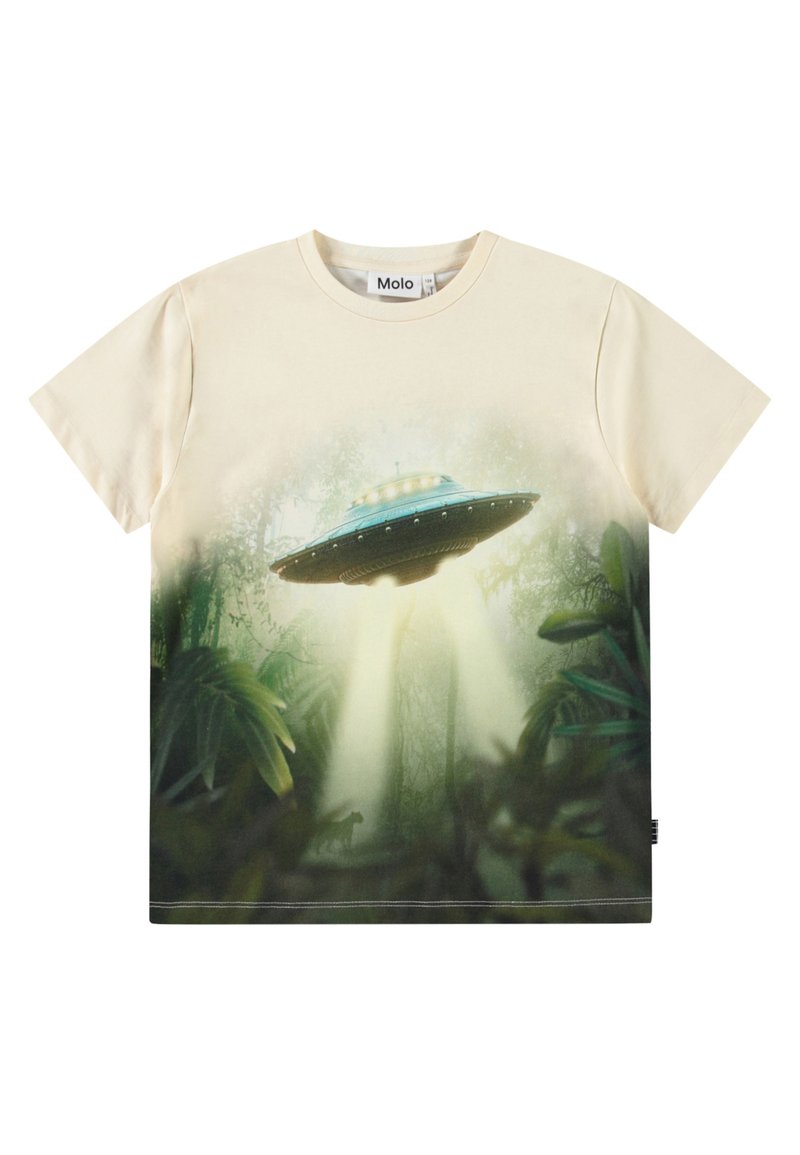 Bomuld T-shirt i cremet farve med trykt UFO og junglescene, med rund hals og korte ærmer. Designet inkluderer detaljer med grønne blade.