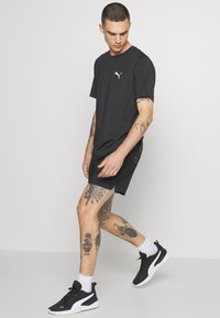Puma RUN CLOUDSPUN - T-Shirt sport - puma black