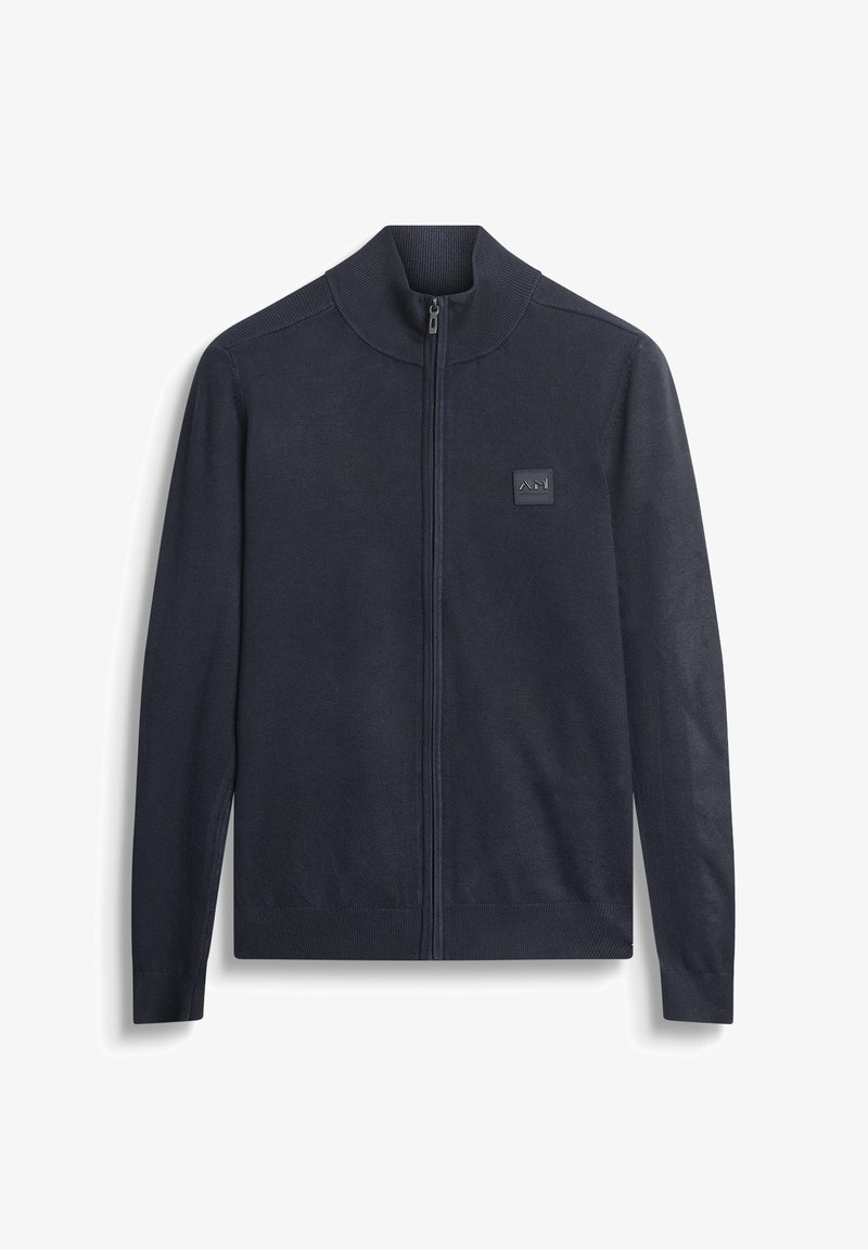 Maglione zip-up navy in morbido tessuto a maglia, con colletto alto e polsini a costine, decorato con una patch logo sul petto.
