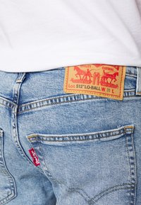 Levi's® 512™ SLIM TAPER LOW BALL - Calças de ganga justas - wolf horizon