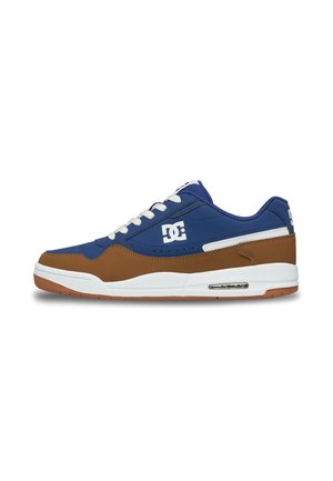 Low-top sneaker with blue upper, brown toe and heel overlays, white laces, white sole, and DC logo on side and heel.