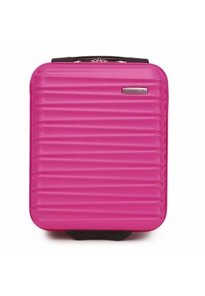 Pink hard-shell carry-on suitcase with horizontal ribbed texture, black wheels, and a top handle for easy transport. Silver logo detail visible.