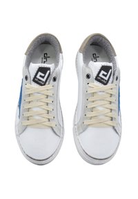 White sneakers with blue and grey leather accents, textured grey suede tongue, and cream laces. Features a logo patch on the tongue.
