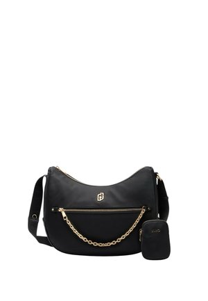 Borsa a tracolla nera in nylon con inserti dorati, dotata di una tasca frontale con zip e una piccola pochette staccabile. Accentatura a catena sul davanti.