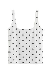 White tank top featuring black polka dots, made of a smooth fabric, with wide straps and a square neckline.
