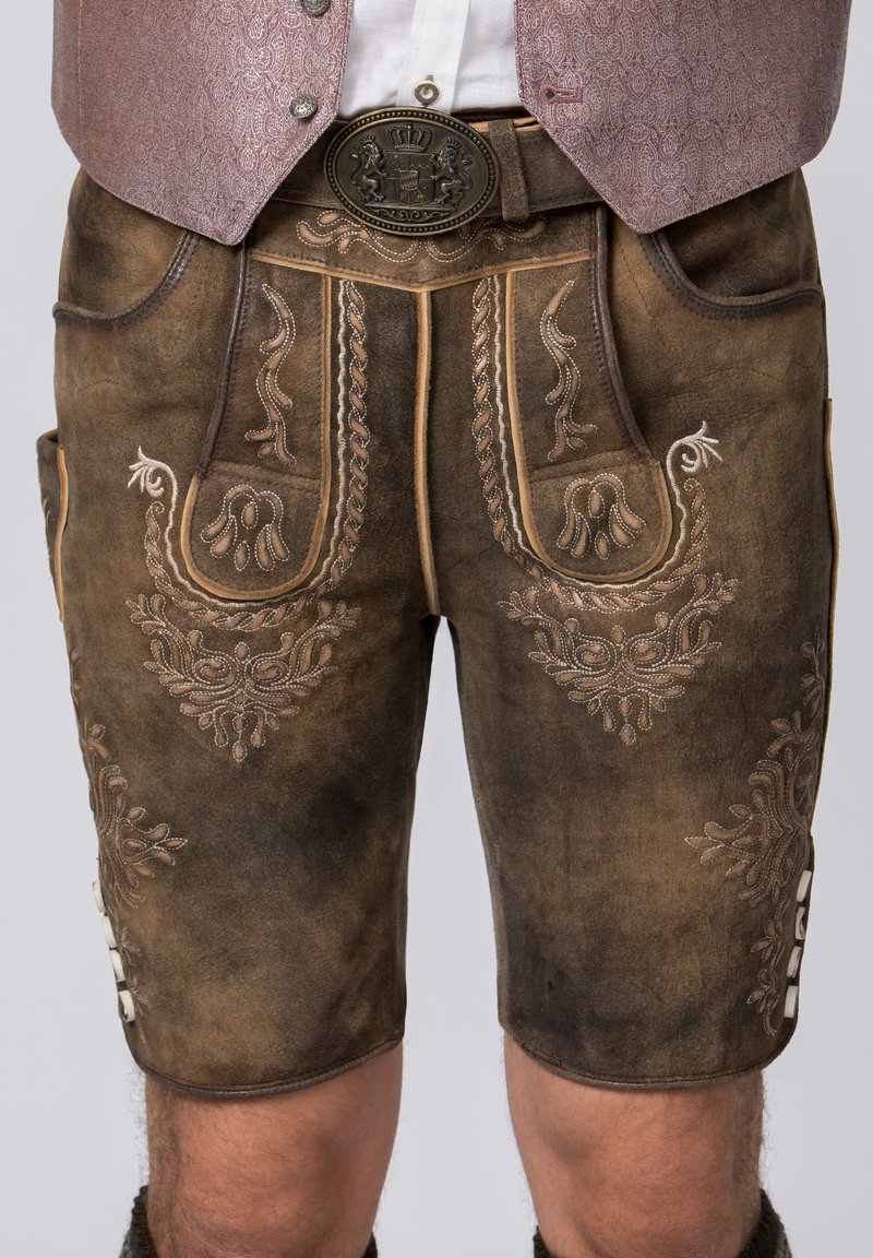 Brown leather shorts with intricate embroidery in silver thread, featuring decorative patterns, pockets, and a button closure on the side.