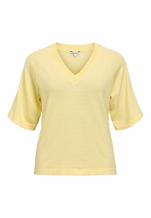 Pull léger à manches courtes jaune pâle avec col en V et coupe décontractée, présenté sur un fond blanc.