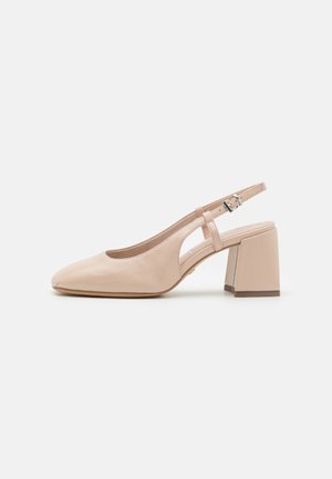Beige leather slingback shoe with a square toe, a mid-height block heel, and an adjustable ankle strap. Features smooth texture and minimal design.