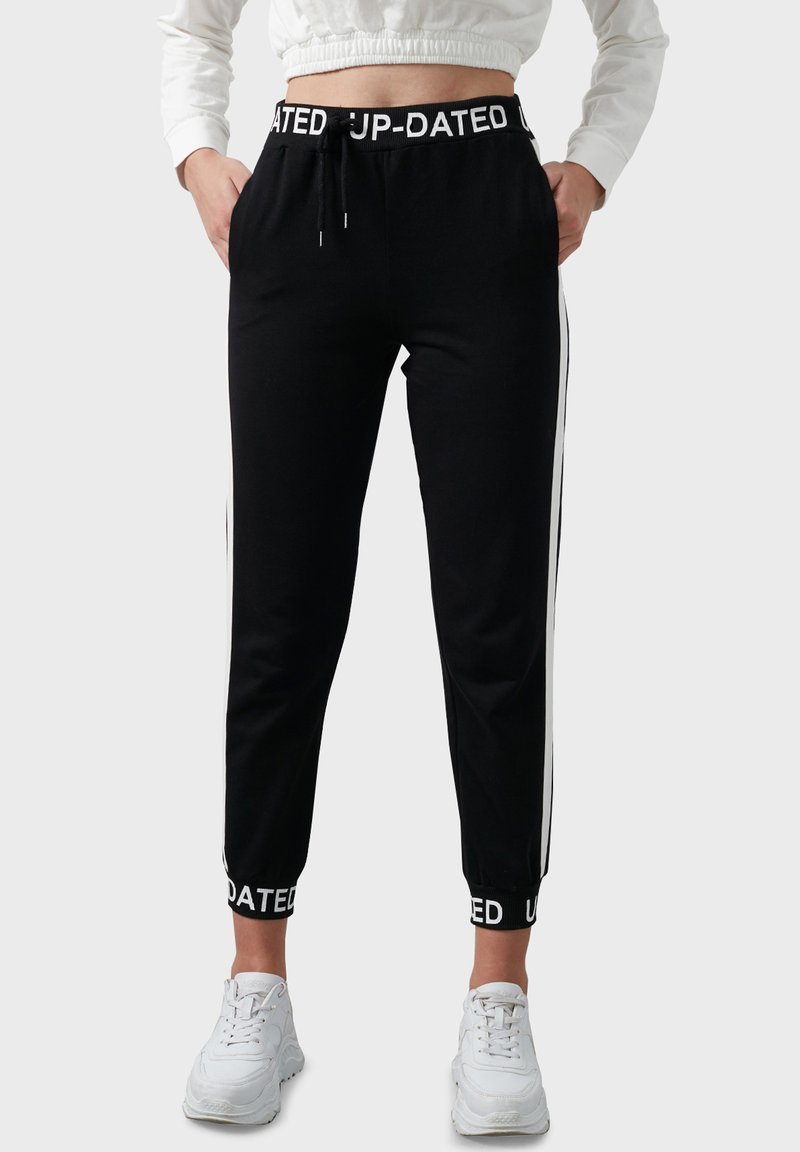 LELA SLIM FIT Tracksuit bottoms black Zalando.ie