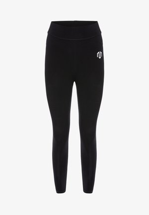 Leggings noirs en tissu extensible, avec une taille haute et un petit logo blanc sur la cuisse gauche. Texture lisse, design ajusté.