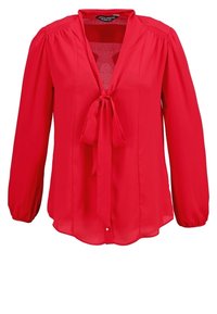 Röd blus med lång ärm i lätt tyg, med knytning i halslinningen, samlade axlar och rundad fåll med knappdetalj vid midjan.