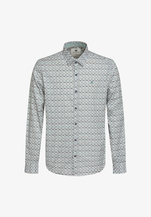 Heledusega helesinine pikkade varrukatega särk, millel on tumehall ja punane lainemuster. Omab nööriga krae ja ühte taskut.