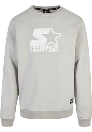 Lichtgrijze Starter sweatshirt met wit logo en ster graphic gecentreerd op de voorkant, ribbelboorden en zoom, ronde hals ontwerp.