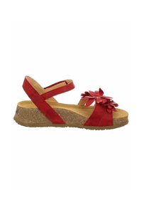 Sandale rouge à bout ouvert avec semelle compensée en liège, bride à la cheville et décorations en forme de fleurs rouges sur la bride avant.