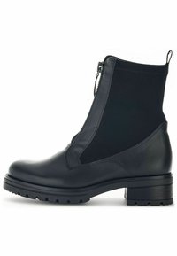 Zwarte enkellaarzen met een gladleren neus en hiel, elastische zijkanten en een ritssluiting voor gemakkelijk aan- en uittrekken. Robuuste loopzool.