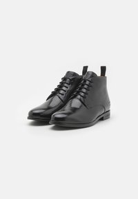 Melvin & Hamilton SELINA 28 - Nööritavad poolsaapad - black/rich tan