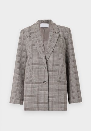 Šedý kostkovaný blazer se strukturálním designem, špičatými klopami, dvouřadovým zapínáním a dvěma předními kapsami. Vyroben z texturované tkaniny.