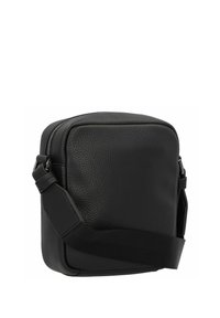 Borsa a tracolla nera in pelle con superficie testurizzata, forma rettangolare, chiusura con zip e tracolla regolabile per maggiore comodità.