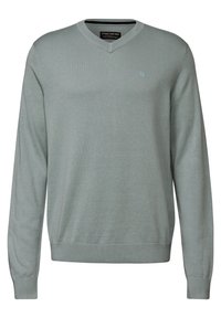 V-ringad tröja i ljusgrön, tillverkad av mjukt stickat material. Har långa ärmar, ribbade cuffs och en liten logotyp på bröstet.