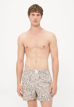 Boxers s leopardím vzorom z bavlny s elastickým pásom; béžové a šedé farby s pohodlným strihom a detailom na gombíkový rozkrok.