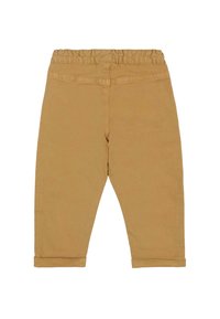 Beżowe bawełniane spodnie z elastycznym pasem, z podwiniętymi mankietami i gładką fakturą. Posiadają tradycyjne szwy kieszeni z tyłu.