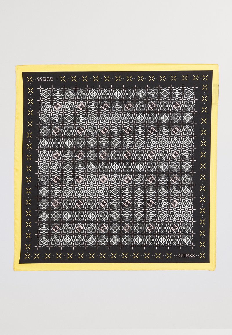 Črno in rumeno kvadratno ruto s zapletenimi geometrijskimi vzorci v beli in roza barvi, obrobljeno z močnim rumenim robom.