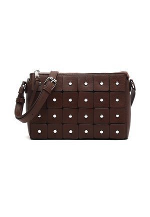 Brown leather crossbody bag with geometric panel design, featuring square accents and circular cut-outs. Adjustable strap and zip closure.