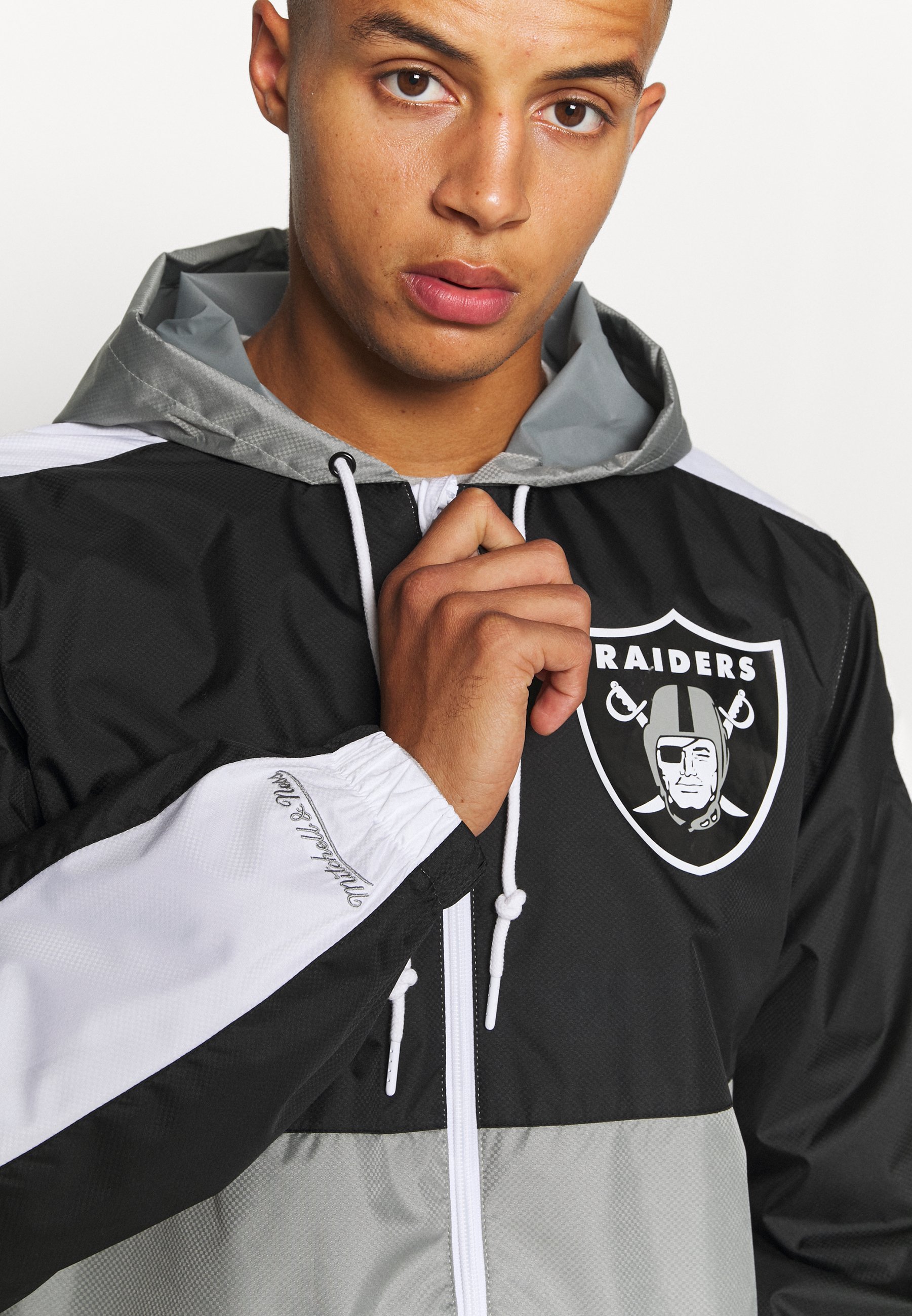 raiders varsity jacket mitchell and ness