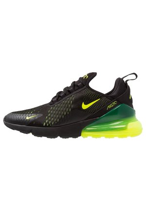 Czarne i neonowo-zielone buty Nike Air 270 z siateczkową cholewką, widoczną podeszwą z poduszką powietrzną i neonowożółtymi logo Swoosh po bokach i na czubku.