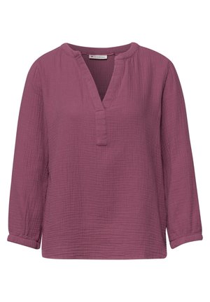 Bluzka z długim rękawem w kolorze mauve z teksturowaną tkaniną, dekoltem w serek i luźnym krojem, z małym stojącym kołnierzykiem i mankietami.